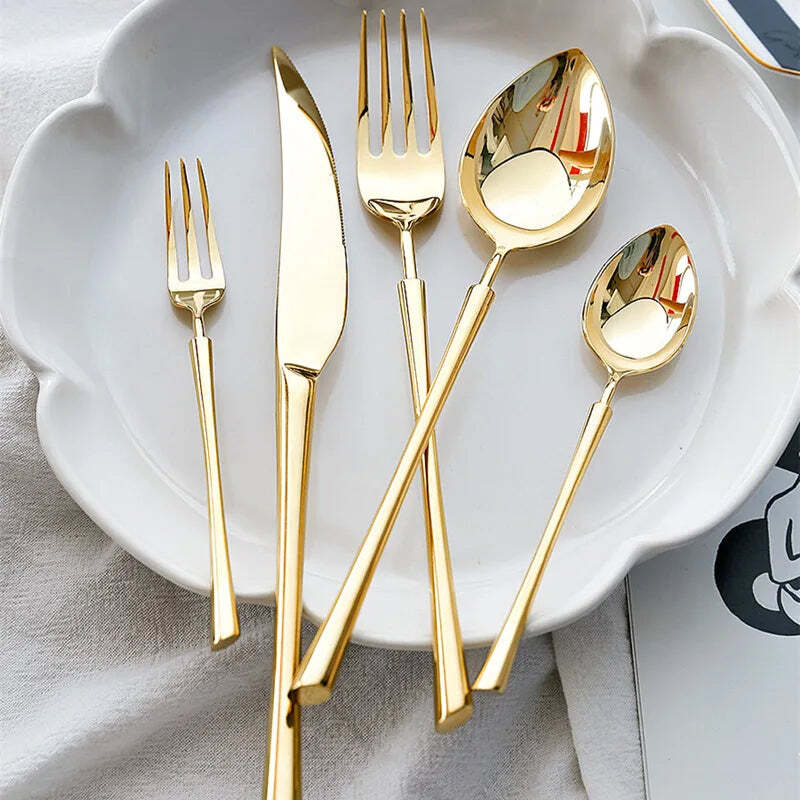 Image of 30-piece shiny gold stainless steel flatware set for stylish dining