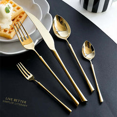 Image of 30-piece shiny gold stainless steel flatware set for stylish dining