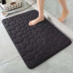 Image of 3D non-slip absorbent stone bath mat with cobblestone embossed design