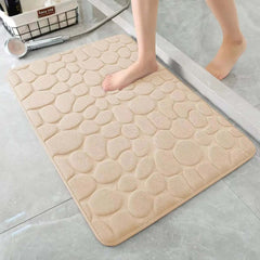 Image of 3D non-slip absorbent stone bath mat with cobblestone embossed design