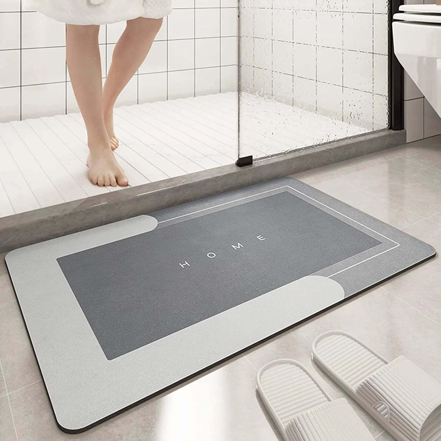 Image of Absorbent diatomite bath mat with non-slip design for comfort and safety