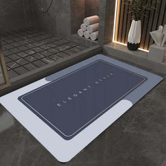 Image of Absorbent diatomite bath mat with non-slip design for comfort and safety