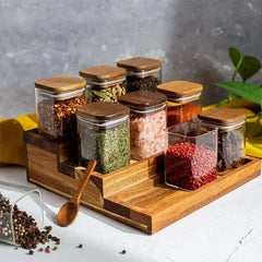 Image of Acacia wood seasoning jars with glass bottles for kitchen storage and spice organization