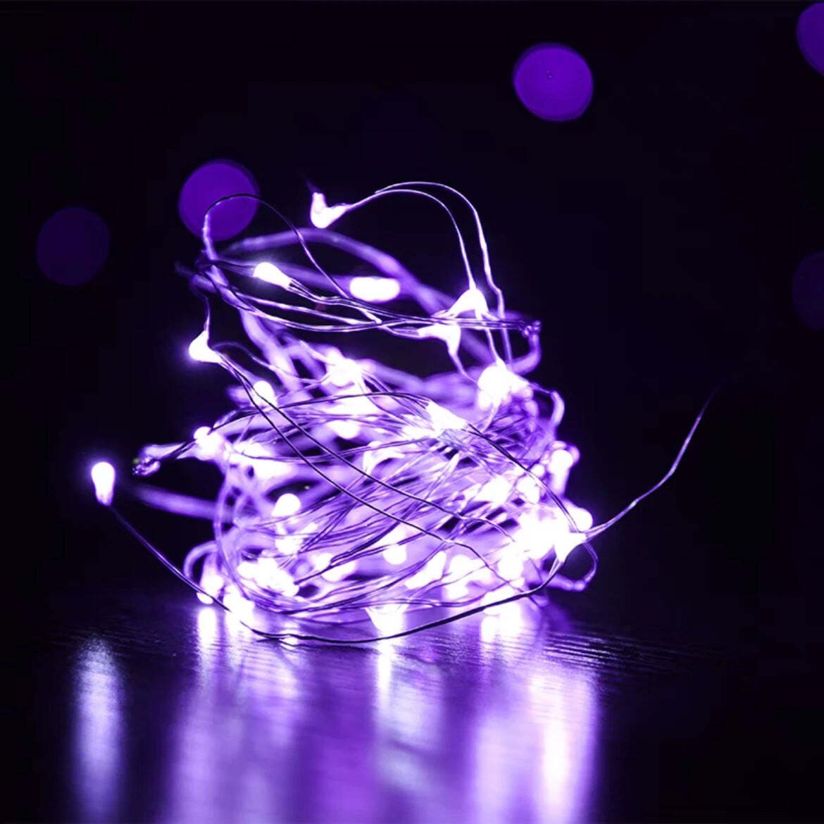 Image of Battery-operated copper wire fairy lights for wedding and holiday decorations