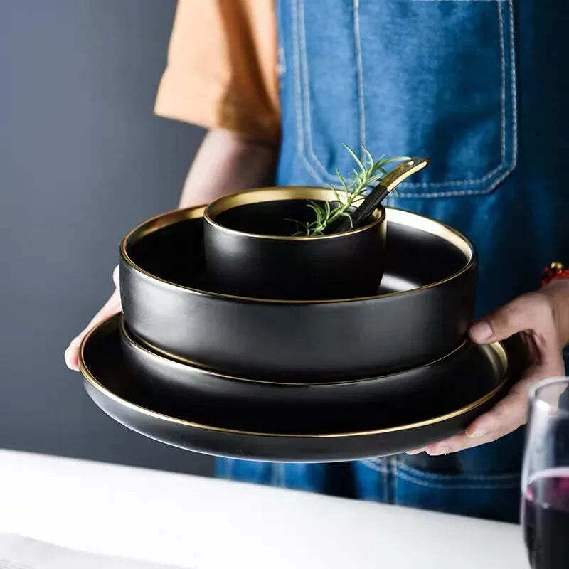 Image of Black porcelain dinnerware set with gold rim for home and restaurant