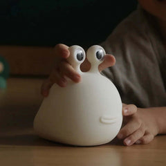 Image of Cartoon slug LED night light for bedroom decor and baby feeding