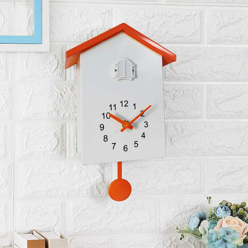 Image of Cuckoo quartz wall clock with modern bird design for home and office decor