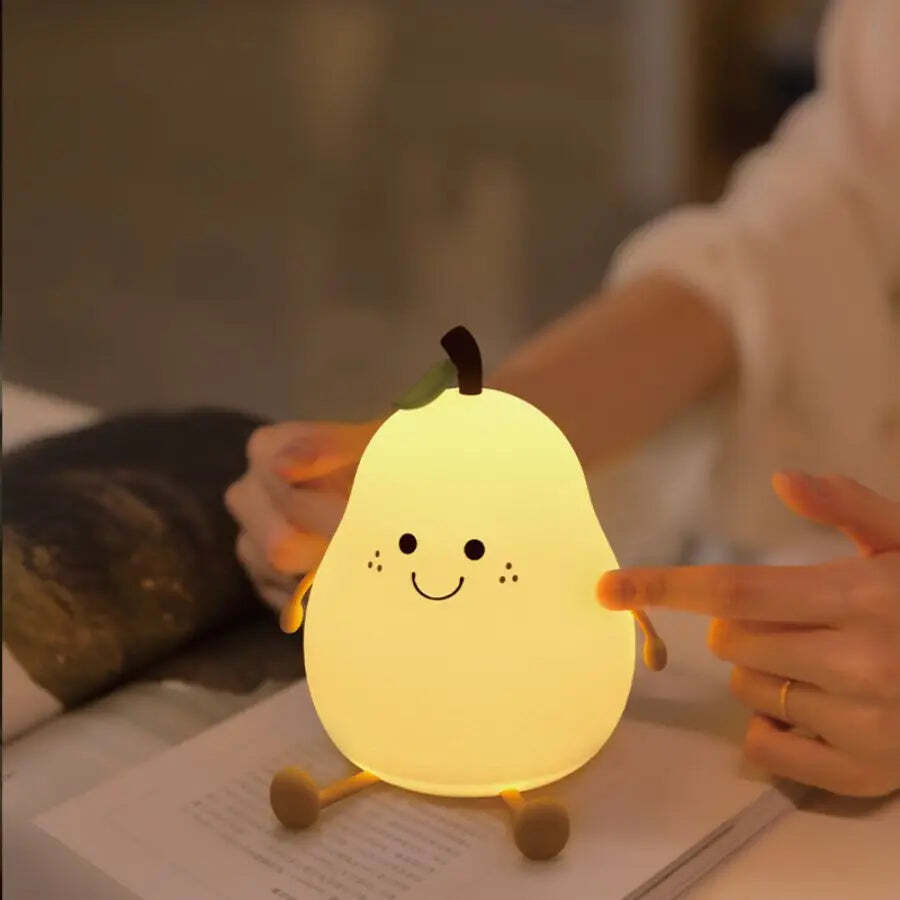 Image of Cute pear-shaped LED night light with touch control, 7 colors, and USB recharge