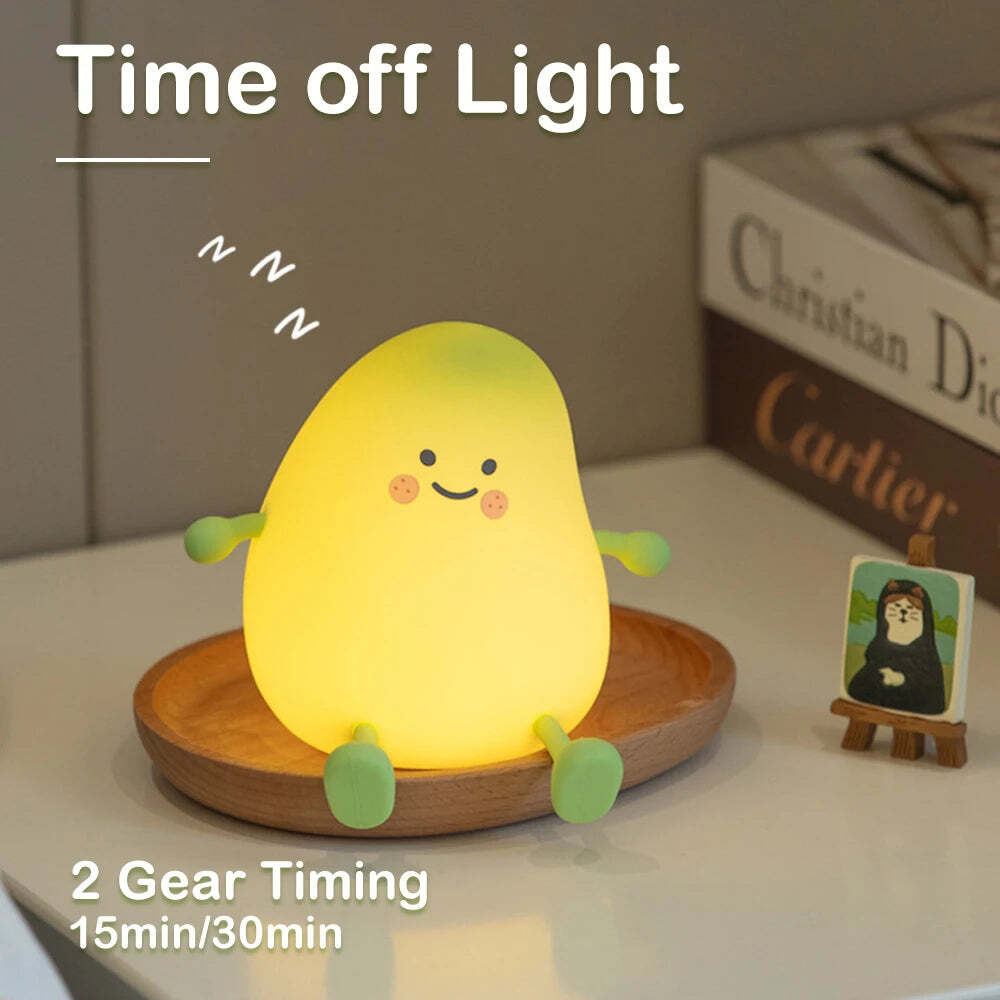 Image of Cute pear-shaped LED night light with touch control, 7 colors, and USB recharge