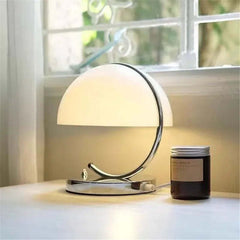 Image of Danish Bauhaus orange small desk lamp for modern minimalist bedroom lighting