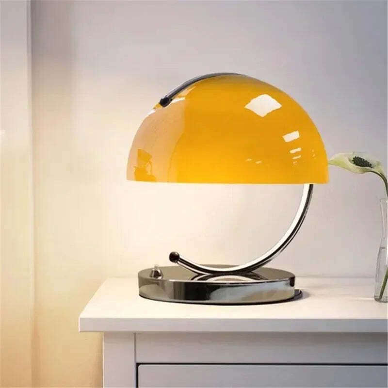 Image of Danish Bauhaus orange small desk lamp for modern minimalist bedroom lighting