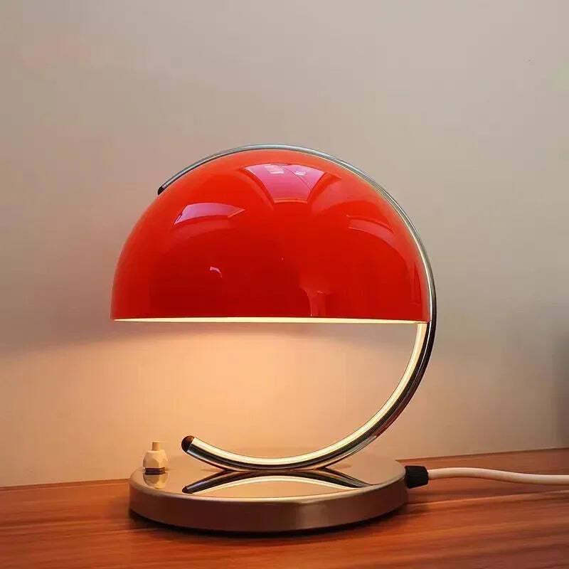 Image of Danish Bauhaus orange small desk lamp for modern minimalist bedroom lighting