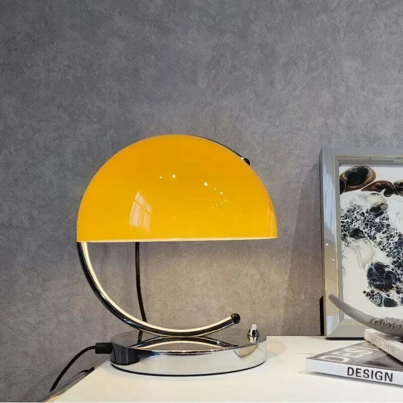 Image of Danish Bauhaus orange small desk lamp for modern minimalist bedroom lighting