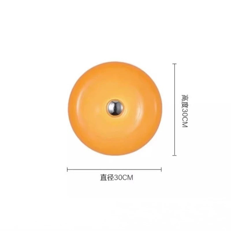 Image of Donut glass wall lamps in orange and white light for stylish indoor ambient lighting