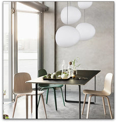 Image of Foscarini Gregg pendant light with round globe glass for modern living rooms