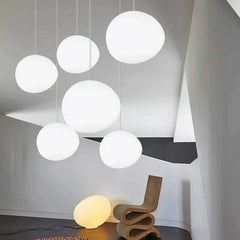 Image of Foscarini Gregg pendant light with round globe glass for modern living rooms