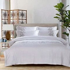 Image of Luxury white Egyptian cotton embroidered bedding set with duvet cover and pillowcases