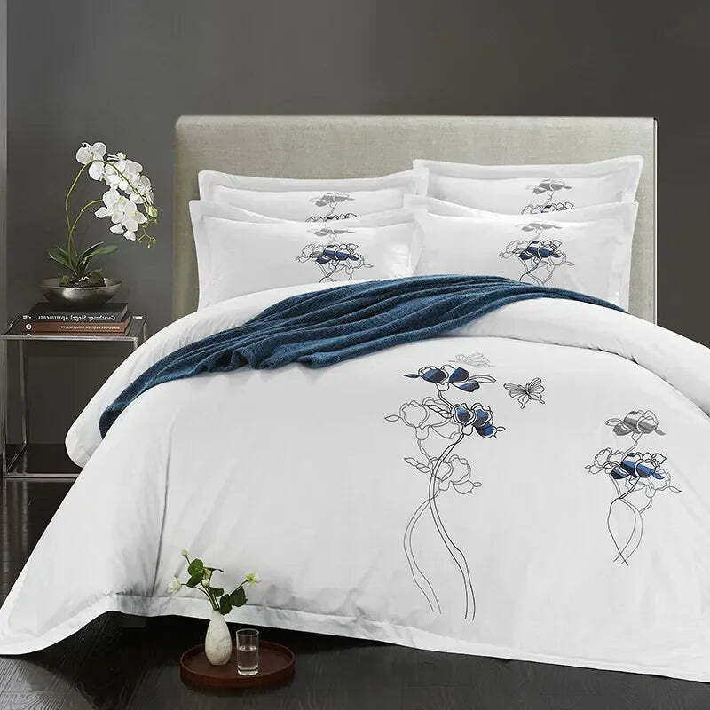 Image of Luxury white Egyptian cotton embroidered bedding set with duvet cover and pillowcases