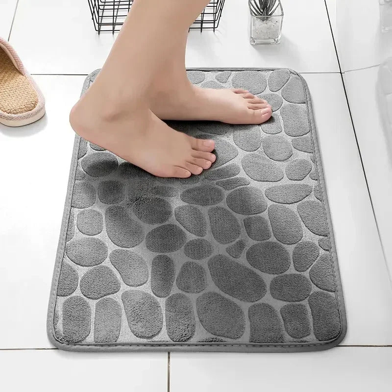 Image of Memory foam non-slip stone bath mat with cobblestone embossed design