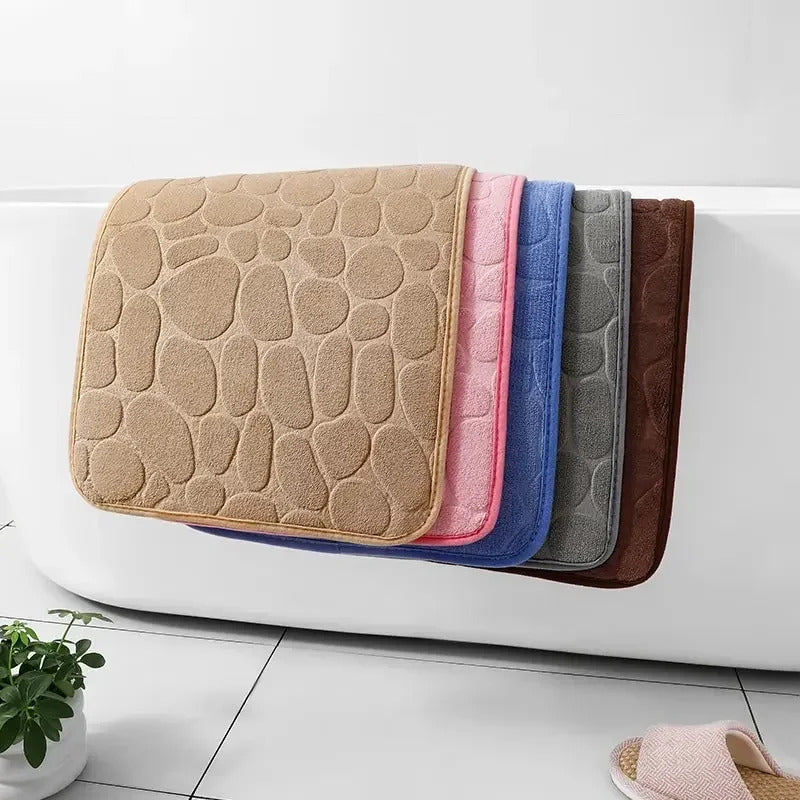 Image of Memory foam non-slip stone bath mat with cobblestone embossed design