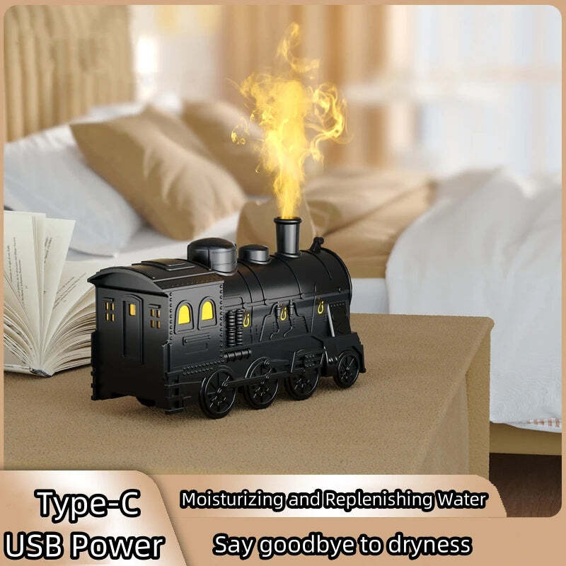 Image of Mini train shape essential oil diffuser with remote control and light functionality