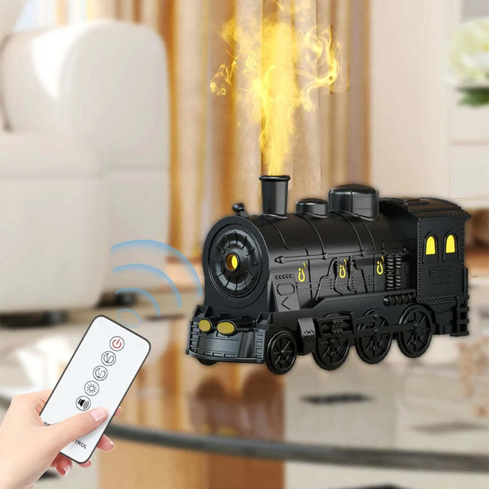 Image of Mini train shape essential oil diffuser with remote control and light functionality