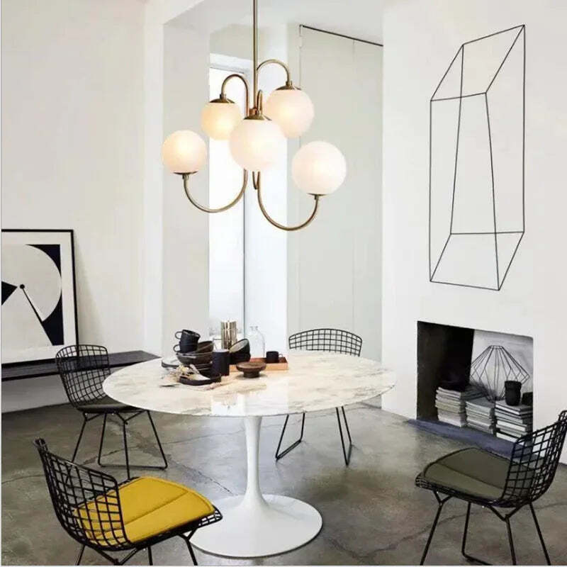 Image of Modern artsy chandelier with white glass balls for dining table and living room decor