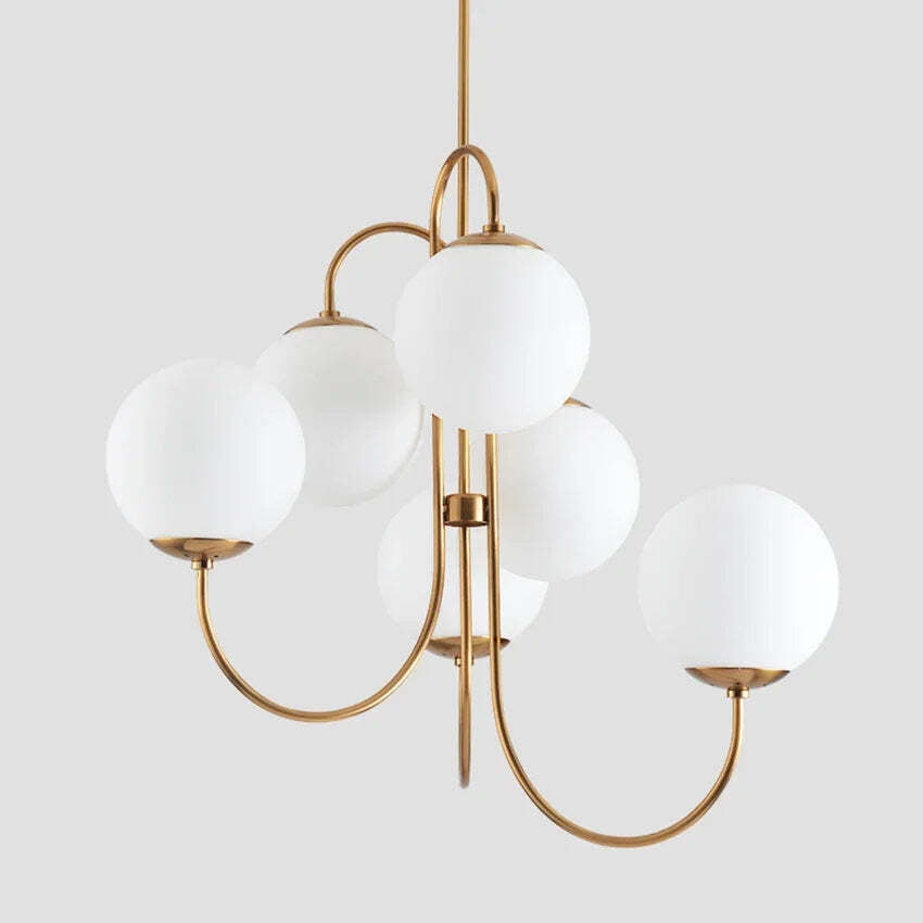 Image of Modern artsy chandelier with white glass balls for dining table and living room decor