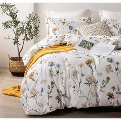 Image of Reversible botanical duvet cover set in yellow with floral pattern