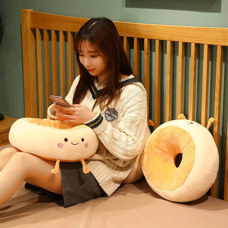 Image of Soft and comfortable cartoon bread-shaped thigh support pillow