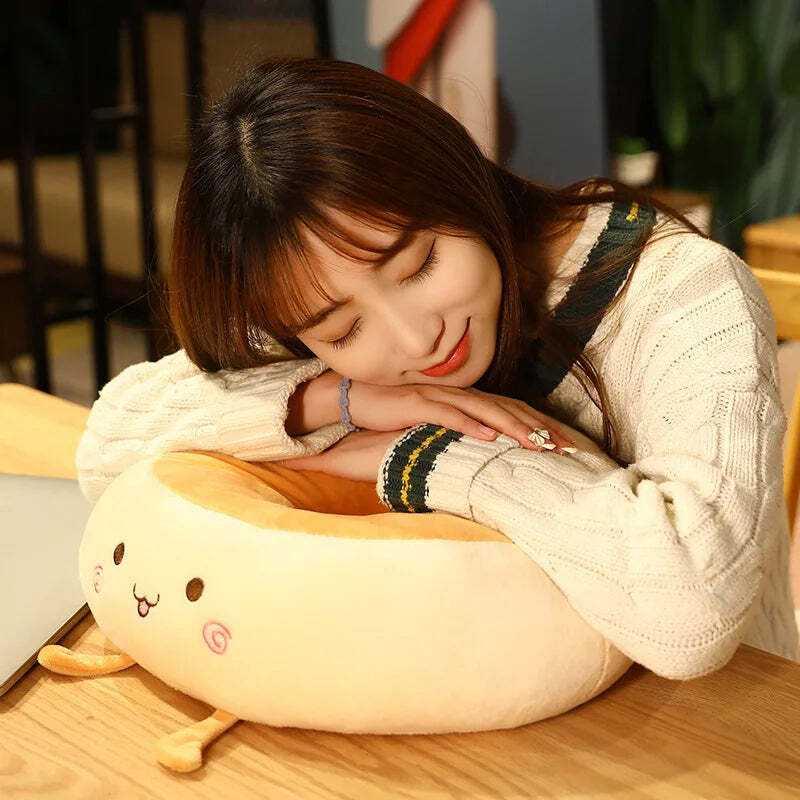 Image of Soft and comfortable cartoon bread-shaped thigh support pillow