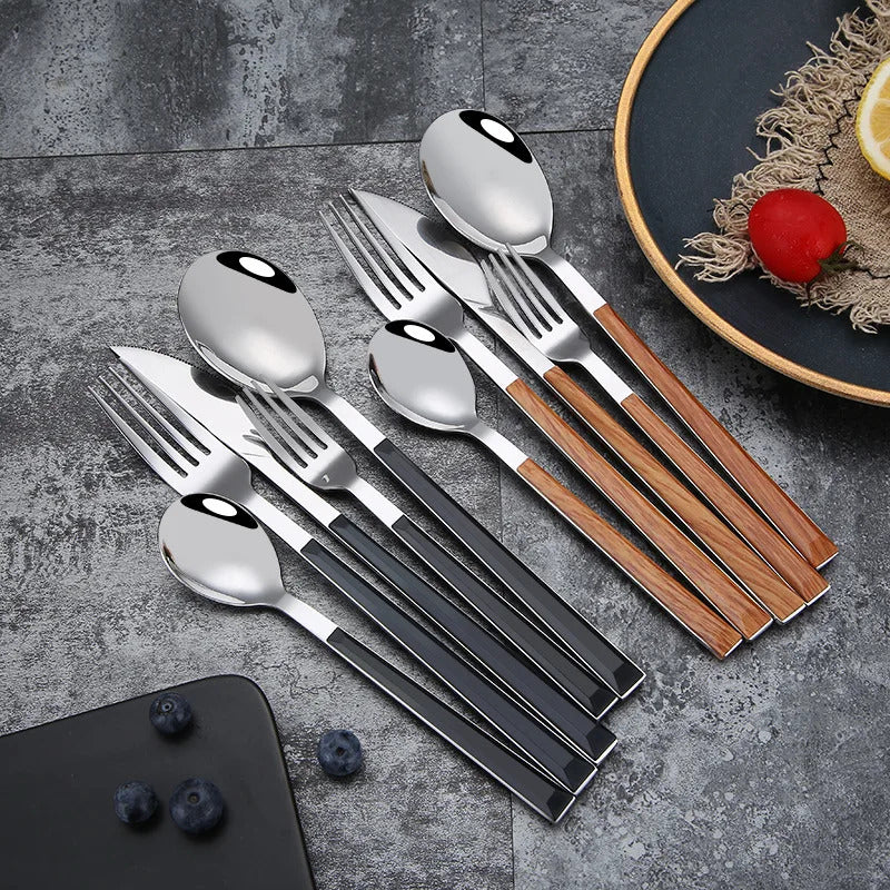 Image of Stainless steel dinnerware set with wooden handle for stylish dining