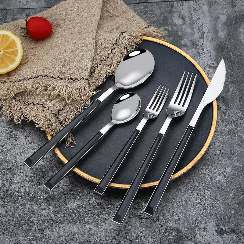 Image of Stainless steel dinnerware set with wooden handle for stylish dining