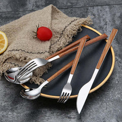 Image of Stainless steel dinnerware set with wooden handle for stylish dining