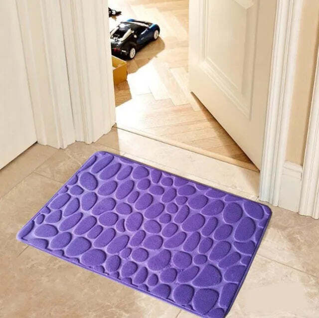 Cobblestone embossed memory foam bath mat with anti-slip backing