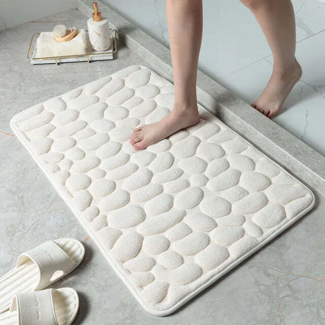 Cobblestone embossed memory foam bath mat with anti-slip backing