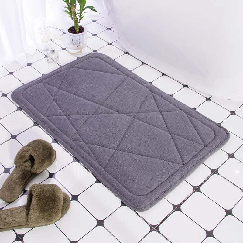 Cobblestone embossed memory foam bath mat with anti-slip backing