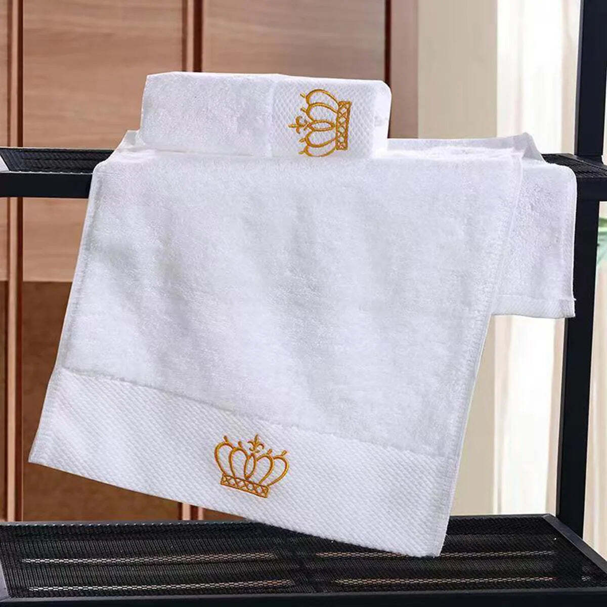 Luxury cotton bath towel set with embroidered crown design