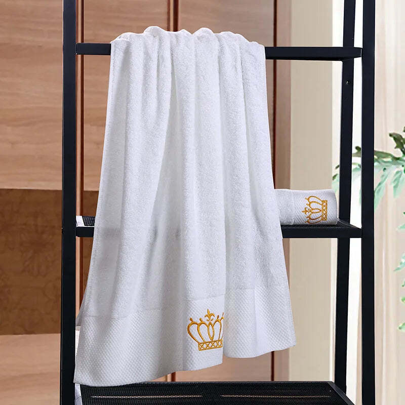 Luxury cotton bath towel set with embroidered crown design