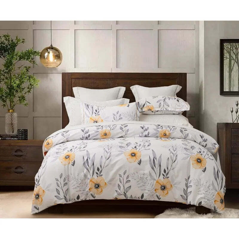 Reversible botanical duvet cover set in yellow with floral pattern