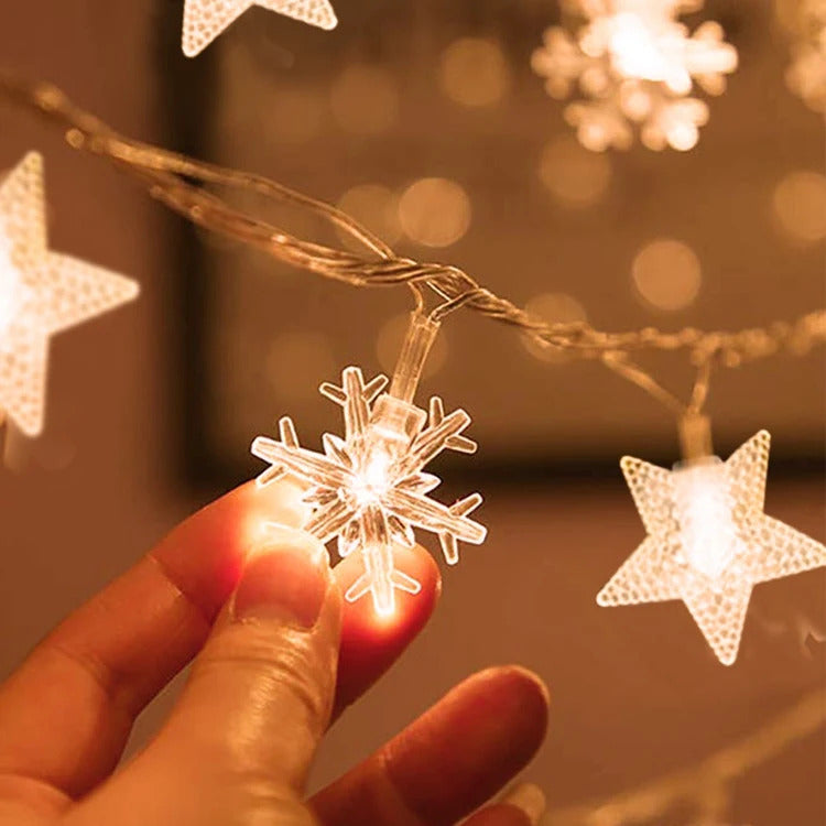 Image of Warm white LED snowflake light garland for Christmas and festive decor