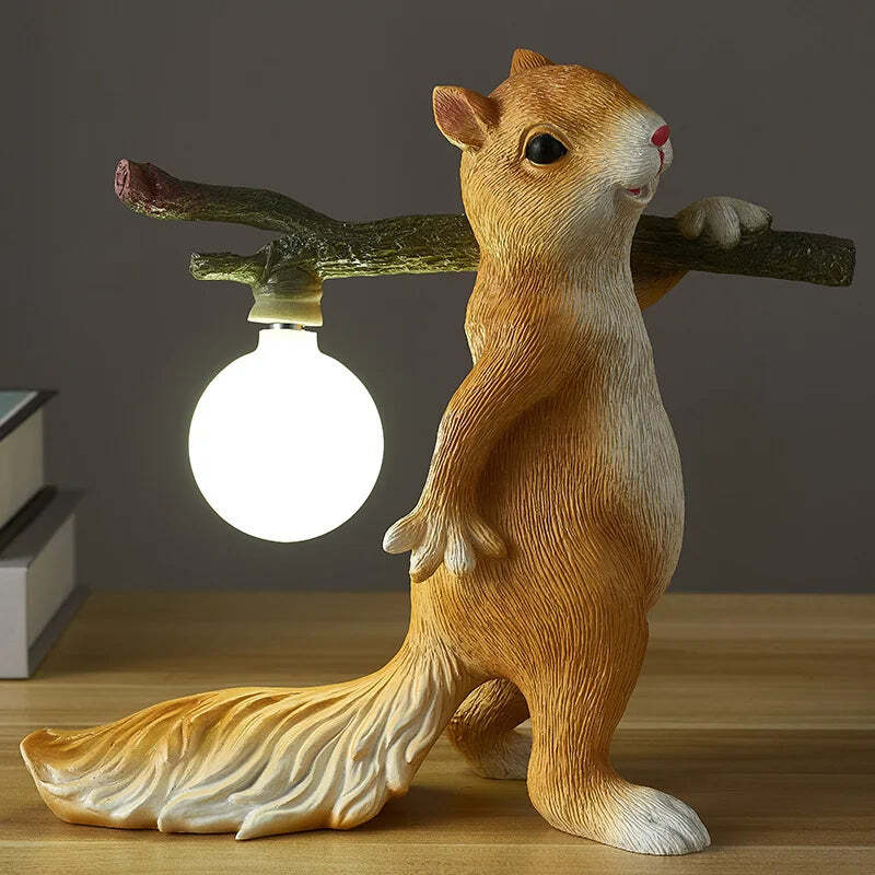 Image of Yellow squirrels desk lamp with white glass ball for children's bedroom decoration