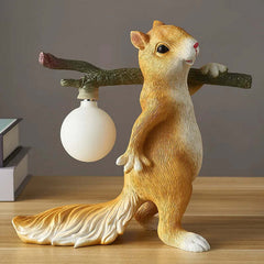 Image of Yellow squirrels desk lamp with white glass ball for children's bedroom decoration