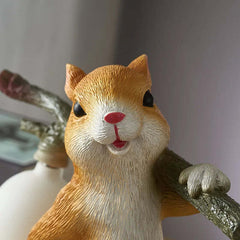 Image of Yellow squirrels desk lamp with white glass ball for children's bedroom decoration